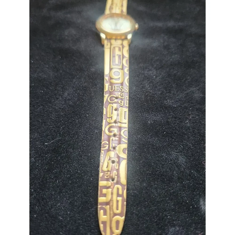 Guess Gold Tone Watch Gold Monogram Leather Band Women's working W/new battery